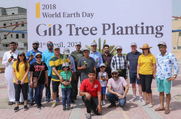 More than 100 people participate in GIB’s World Earth Day 2018 tree planting event