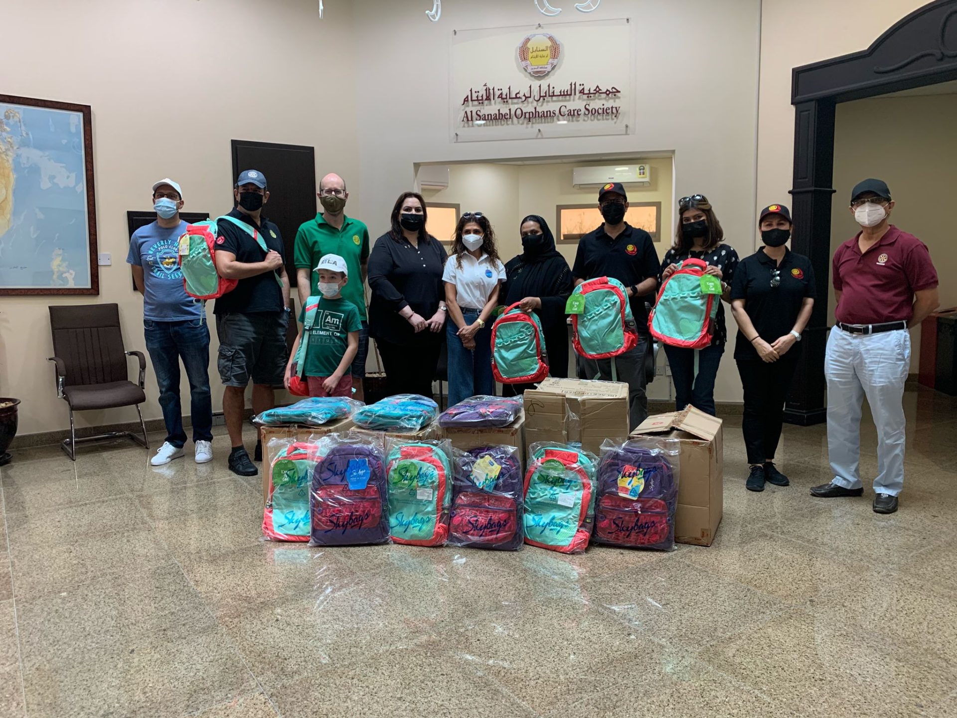 Rotary Club's of Bahrain distribute school bags to charity societies