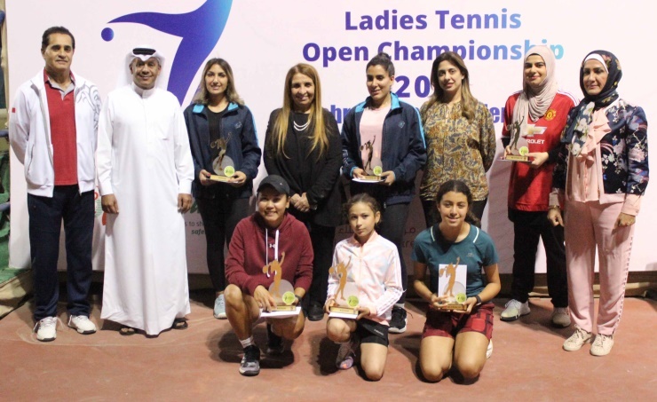 Ladies; tennis champions crowned